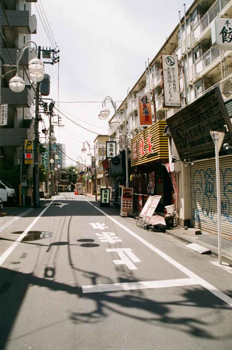 photo of empty street between buildings